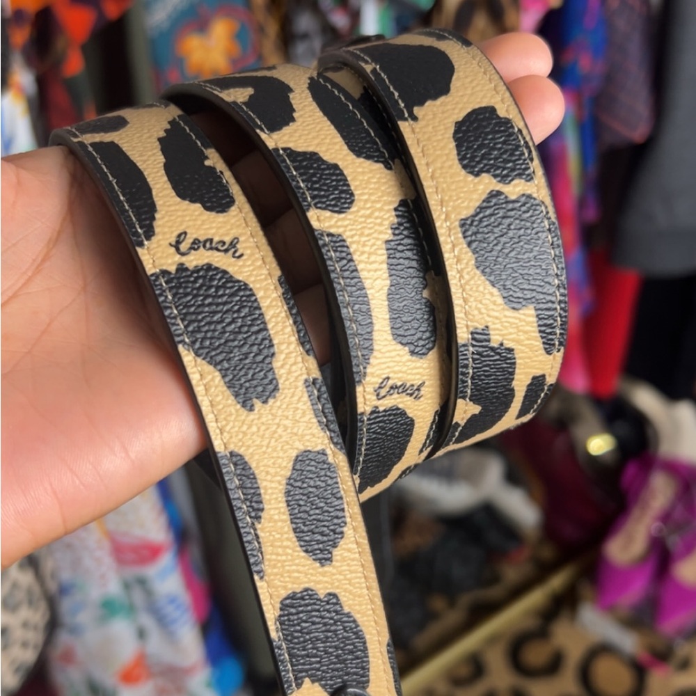 Coach animal print double clip shoulder strap.  49” in long , adjustable
